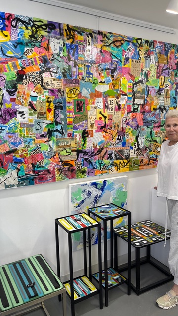 Bonnie Ziskin in her studio with a large mixed media collage